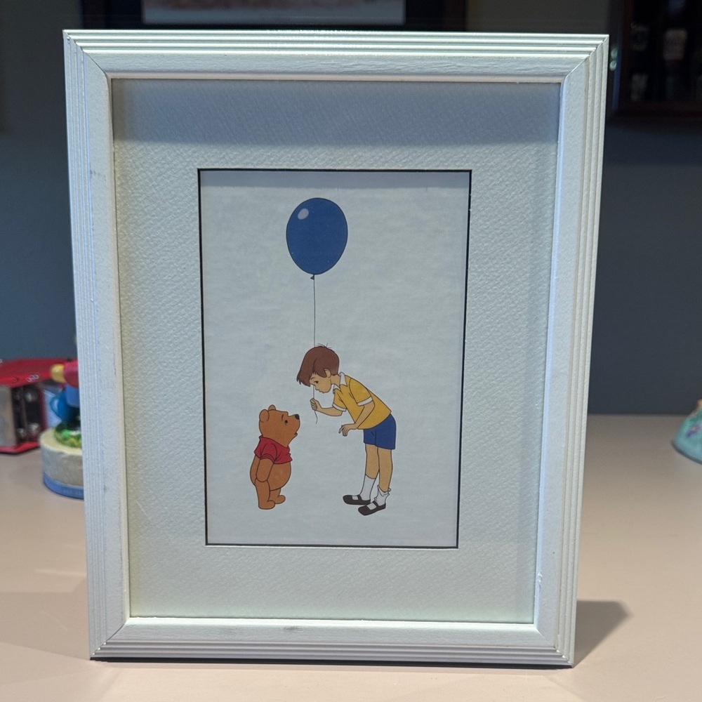 Winnie the Pooh and Christopher Robin.  Winnie the Pooh and the blustery day!